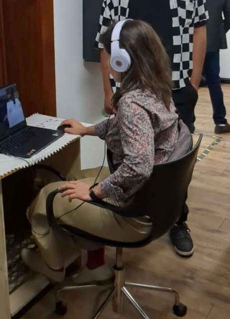 photo of a woman playing the game